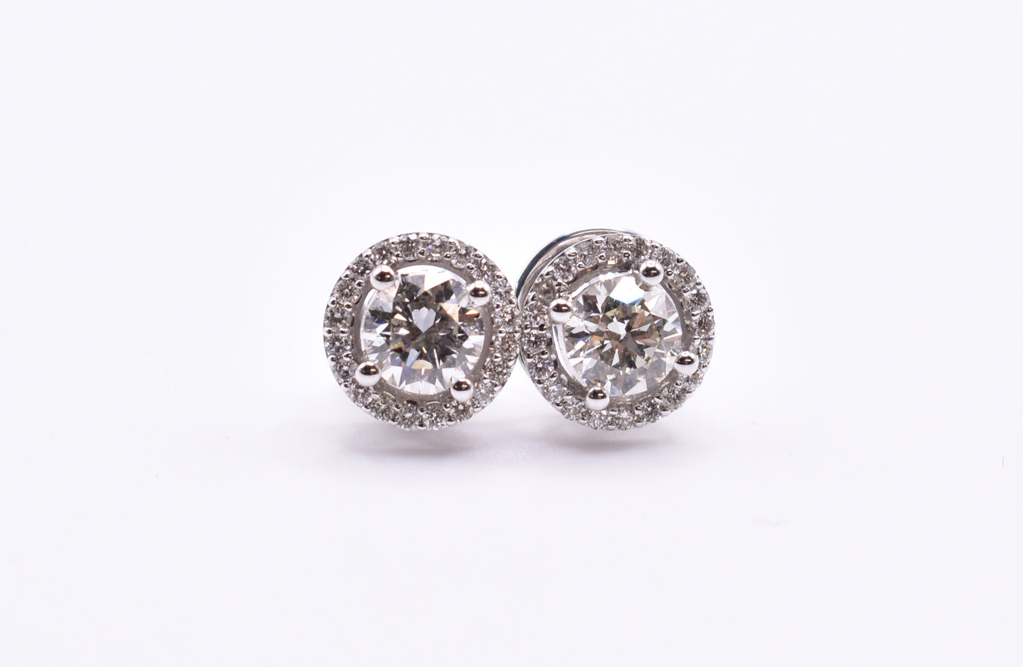 Pair of 18k White Gold Diamond Halo Stud Earrings