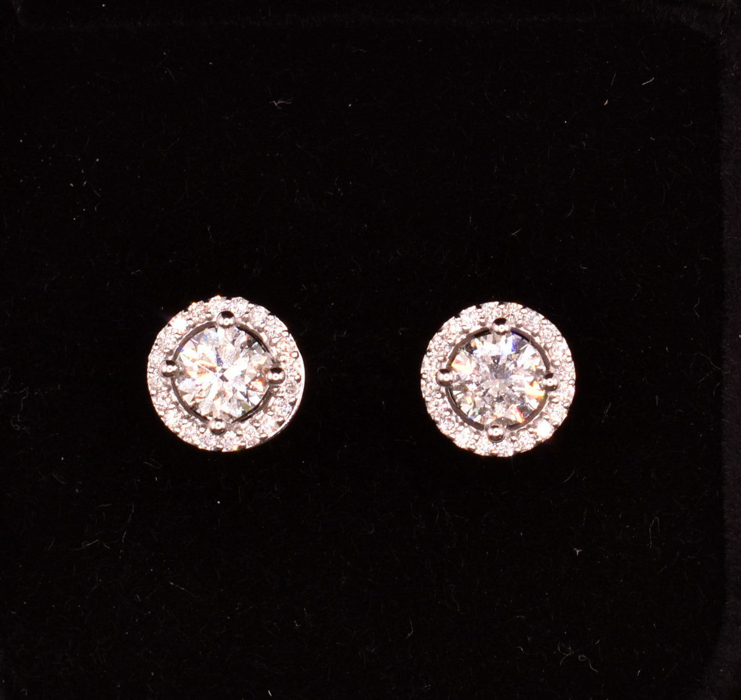 Pair of 18k White Gold Diamond Halo Stud Earrings